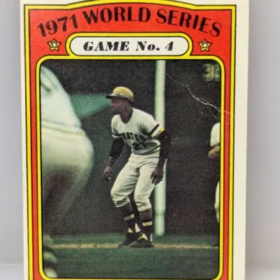 Sale Photo Thumbnail #374: 1972 Topps #226 1971 World Series Game 4 baseball card featuring Roberto Clemente. Shows minor surface creasing on the right edge.