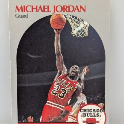 Sale Photo Thumbnail #479: 1989-90 NBA Hoops Michael Jordan #200 trading card depicting a Chicago Bulls action shot.