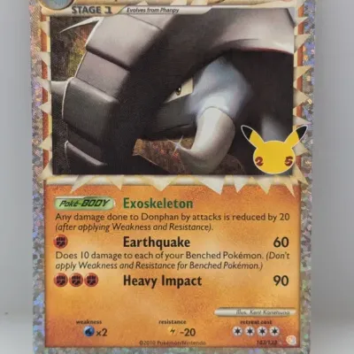 Sale Photo Thumbnail #379: 25th Anniversary Celebrations Donphan Prime Pokémon trading card with holographic foil border.