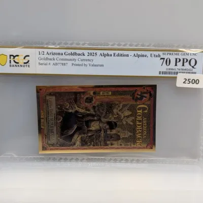 Sale Photo Thumbnail #825: PCGS-graded Supreme Gem UNC 70 PPQ 1/2 Arizona Goldback 2025 Alpha Edition community currency note in a protective holder.