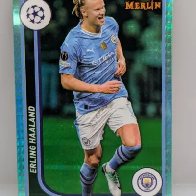 Sale Photo Thumbnail #45: Topps Merlin UEFA Champions League Erling Haaland aqua ice refractor trading card, featuring the Manchester City forward in good condition.
