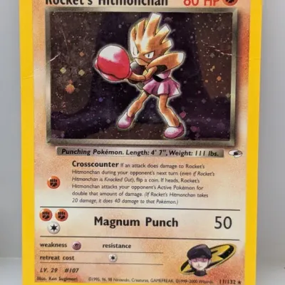 Sale Photo Thumbnail #344: Wizards of the Coast Pokémon Rocket's Hitmonchan holographic trading card, #11/132 from the Gym Heroes set, year 2000.