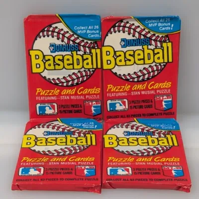 Sale Photo Thumbnail #363: Four unopened wax packs of 1988 Donruss Baseball Puzzle and Cards, featuring the Stan Musial puzzle.