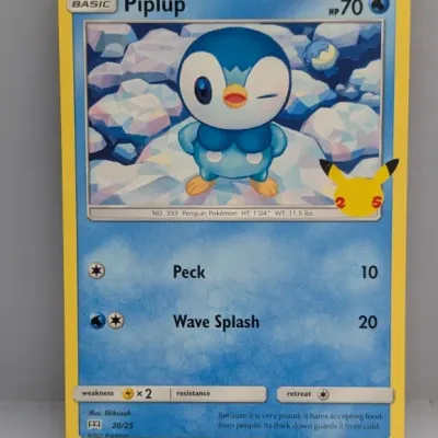 Sale Photo Thumbnail #719: 2021 Pokémon TCG 25th Anniversary Celebrations McDonald's promo Piplup card (20/25) in near-mint condition.