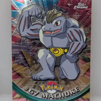 Sale Photo Thumbnail #764: Topps Chrome Pokémon trading card featuring #67 Machoke with a foil metallic finish, circa 2000.