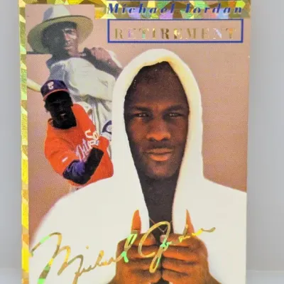 Sale Photo Thumbnail #249: 1994 Upper Deck Michael Jordan Retirement baseball card featuring hologram borders and gold foil facsimile signature.