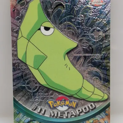 Sale Photo Thumbnail #736: 2000 Topps Chrome Pokémon Series 1 Metapod #11 spectra chrome foil trading card.