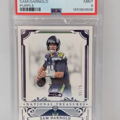 Sale Photo Thumbnail #145: PSA-graded 9 Mint 2025 National Treasures Purple Sam Darnold trading card, serial numbered 55/75.
