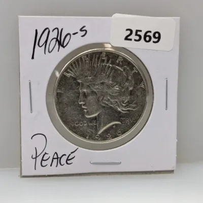 Sale Photo Thumbnail #894: 1926-S Peace silver dollar coin presented in a protective cardboard flip holder.