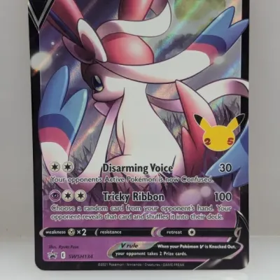 Sale Photo Thumbnail #625: Pokémon TCG Dark Sylveon V promo card (SWSH134) from the 25th Anniversary Celebrations series, featuring full-art holofoil artwork.