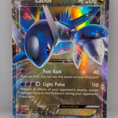 Sale Photo Thumbnail #569: Latios EX full-art promo Pokémon trading card, number XY72, featuring holographic finish, copyright 2015.