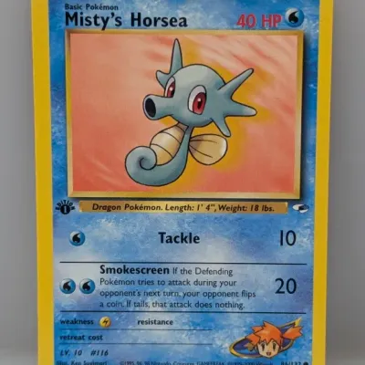 Sale Photo Thumbnail #488: Vintage 1st Edition Misty's Horsea Pokémon trading card (#86/132) from the Gym Heroes set, released by Wizards of the Coast in 2000.