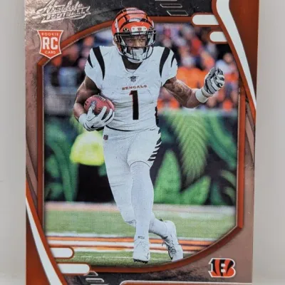 Sale Photo Thumbnail #210: 2021 Panini Absolute Football Ja'Marr Chase rookie trading card, featuring the Cincinnati Bengals wide receiver in uniform.