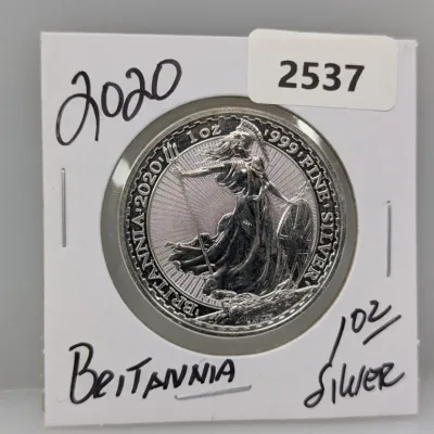 Sale Photo Thumbnail #862: 2020 Great Britain 1 oz Britannia .999 fine silver coin housed in a protective cardboard flip holder.