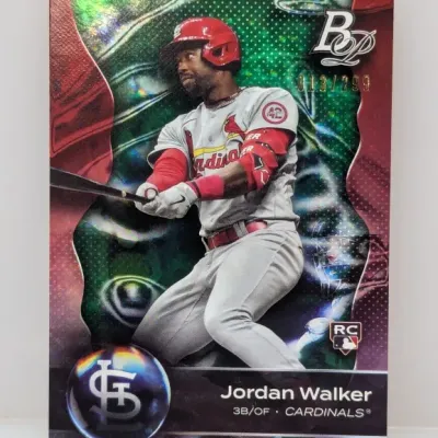 Sale Photo Thumbnail #292: 2023 Bowman Platinum Jordan Walker rookie baseball card, green refractor parallel serial-numbered 013/299 in sharp condition.