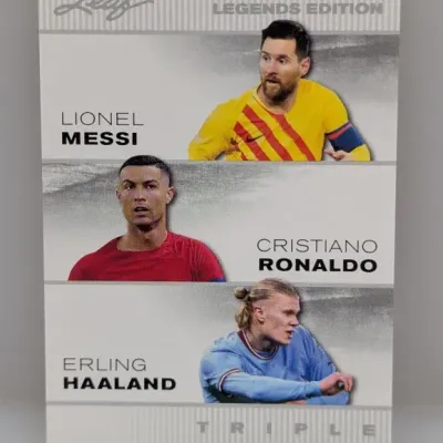 Sale Photo Thumbnail #201: Leaf Exclusive Legends Edition soccer trading card featuring Lionel Messi, Cristiano Ronaldo, and Erling Haaland.