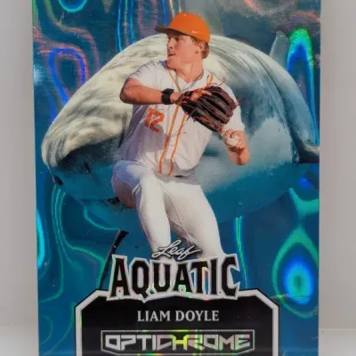 Sale Photo Thumbnail #218: Leaf Aquatic Optichrome trading card featuring baseball player Liam Doyle with a shark background.