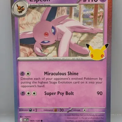 Sale Photo Thumbnail #185: Pokémon Espeon trading card, number 069/128 from the 25th Anniversary Celebrations collection, featuring full-art holofoil artwork.