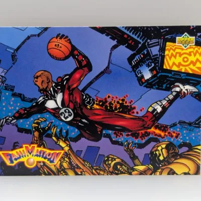 Sale Photo Thumbnail #571: 1992-93 Upper Deck Fanimator Agent 23 Michael Jordan basketball trading card, featuring artwork by Jim Lee.