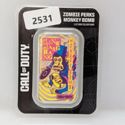 Sale Photo Thumbnail #856: Call of Duty Zombie Perks Monkey Bomb 1 oz .999 silver bar sealed in original blister pack packaging.