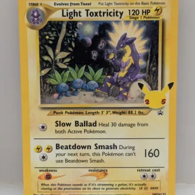 Sale Photo Thumbnail #645: 2021 Pokémon Light Toxtricity SWSH137 Black Star Promo holofoil trading card featuring the 25th Anniversary logo.