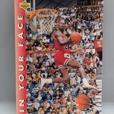 Sale Photo Thumbnail #542: 1992-93 Upper Deck 'In Your Face' Michael Jordan basketball trading card #AN8 featuring metallic foil text details.