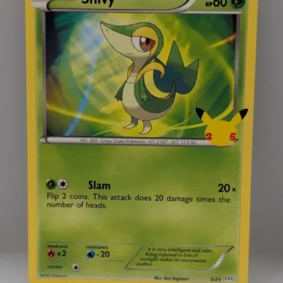 Sale Photo Thumbnail #695: Snivy Pokémon trading card from the 25th Anniversary McDonald's Collection, set number 5/25, copyright 2021.
