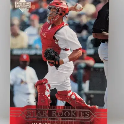 Sale Photo Thumbnail #438: 2004 Upper Deck Star Rookies Yadier Molina baseball trading card, featuring the St. Louis Cardinals catcher in his gear.