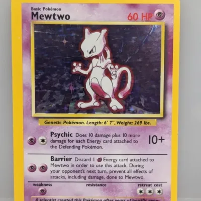 Sale Photo Thumbnail #65: 1999 Pokémon Base Set holographic Mewtwo trading card (#10/102), featuring artwork by Ken Sugimori.
