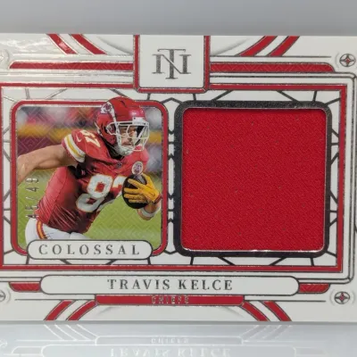 Sale Photo Thumbnail #761: Panini National Treasures Colossal Travis Kelce jersey relic card, serial numbered 45/49.