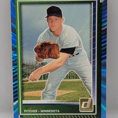 Sale Photo Thumbnail #475: Donruss Jim Kaat Minnesota Twins baseball card featuring a blue foil border design and serial-numbered edition stamped on the front.