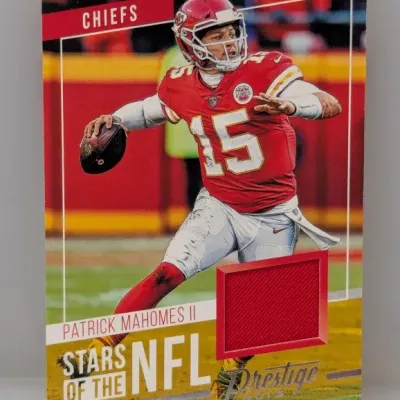 Sale Photo Thumbnail #360: 2019 Panini Prestige Stars of the NFL Patrick Mahomes II trading card featuring an embedded jersey relic swatch.