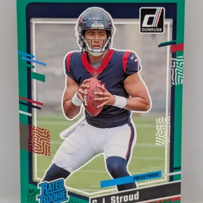 Sale Photo Thumbnail #171: 2023 Donruss C.J. Stroud Rated Rookie Press Proof green border football trading card.