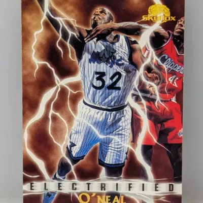Sale Photo Thumbnail #350: 1994-95 SkyBox Premium 'Electrified' Shaquille O'Neal insert trading card featuring lightning graphics.