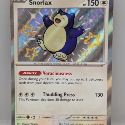 Sale Photo Thumbnail #383: Shiny Snorlax secret rare holographic Pokémon trading card from the Paldean Fates expansion set, card number 202/091.