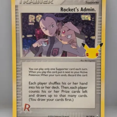 Sale Photo Thumbnail #456: Pokémon Trading Card Game Rocket's Admin. 86/109 card featuring the 25th Anniversary stamp, illustrated by Ken Sugimori.