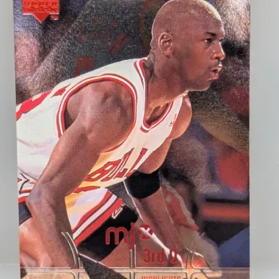 Sale Photo Thumbnail #88: 1998-99 Upper Deck MJx Michael Jordan #3rd Q Highlights trading card featuring a metallic finish.