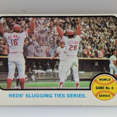 Sale Photo Thumbnail #561: 1971 Topps World Series Game 6 baseball card #332 featuring 'Reds' Slugging Ties Series' with Denis Menke and Bobby Tolan.