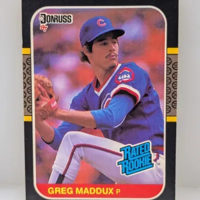 Sale Photo Thumbnail #712: 1987 Donruss Rated Rookie trading card featuring Greg Maddux (#36) in a Chicago Cubs uniform.