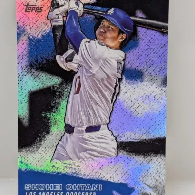Sale Photo Thumbnail #584: Topps Shohei Ohtani Los Angeles Dodgers trading card featuring a metallic holographic background.