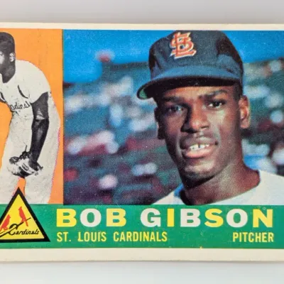 Sale Photo Thumbnail #544: 1960 Topps Bob Gibson #148 baseball card featuring the St. Louis Cardinals pitcher.