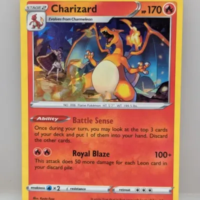 Sale Photo Thumbnail #435: 2020 Pokémon TCG Vivid Voltage Charizard holo card (#025/185) with Battle Sense ability.