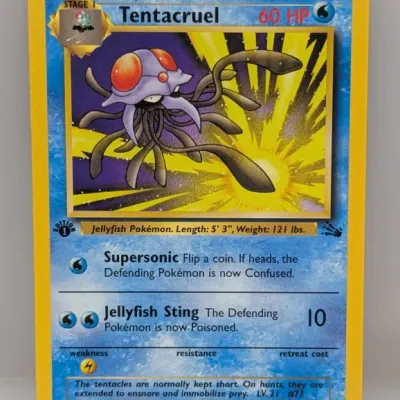Sale Photo Thumbnail #190: 1st Edition Tentacruel Pokémon trading card (#44/62) from the 1999 Fossil set, illustrated by Kagemaru Himeno.