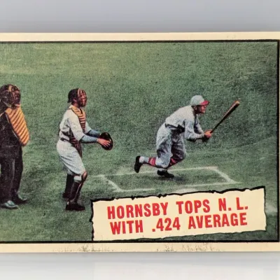Sale Photo Thumbnail #274: 1960 Topps baseball card #423 featuring Rogers Hornsby, celebrating his .424 batting average, in vintage condition with light corner wear.