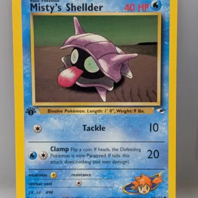 Sale Photo Thumbnail #499: Misty's Shellder 1st Edition Pokémon trading card, set 89/132 from Gym Heroes, circa 2000.