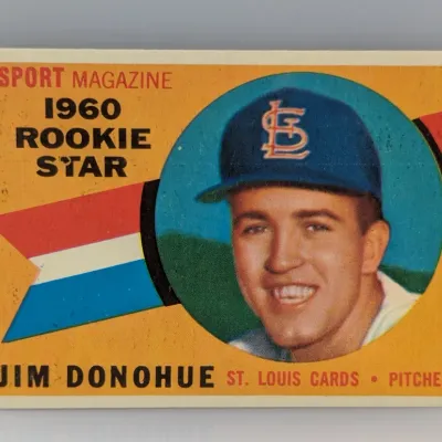 Sale Photo Thumbnail #406: 1960 Topps Jim Donohue Sport Magazine Rookie Star trading card #117 featuring the St. Louis Cardinals pitcher.