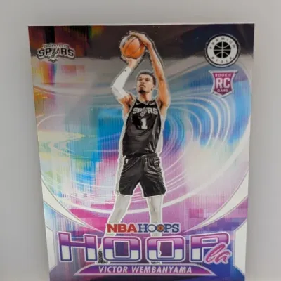 Sale Photo Thumbnail #263: 2023-24 Panini NBA Hoops Premium Stock 'Hooray' Victor Wembanyama rookie trading card in crisp condition.