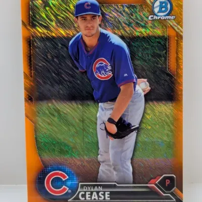 Sale Photo Thumbnail #538: Bowman Chrome orange refractor baseball trading card featuring Dylan Cease in a Chicago Cubs uniform.