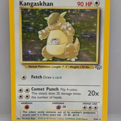 Sale Photo Thumbnail #49: Vintage 1999 Wizards of the Coast Pokémon Jungle set holographic Kangaskhan trading card (#5/64), featuring artwork by Mitsuhiro Arita with visible light surface wear on the foil.