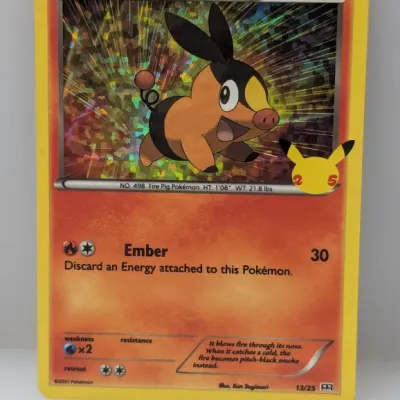 Sale Photo Thumbnail #686: Pokémon Tepig 25th Anniversary McDonald's promo holofoil trading card, numbered 13/25 and dated 2021.